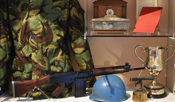 Regimental Display with uniform, helmet and rifle